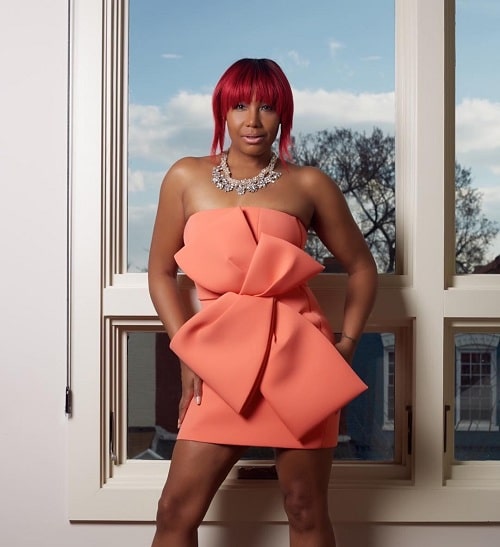 A picture of Traci Braxton in a pic one piece.
